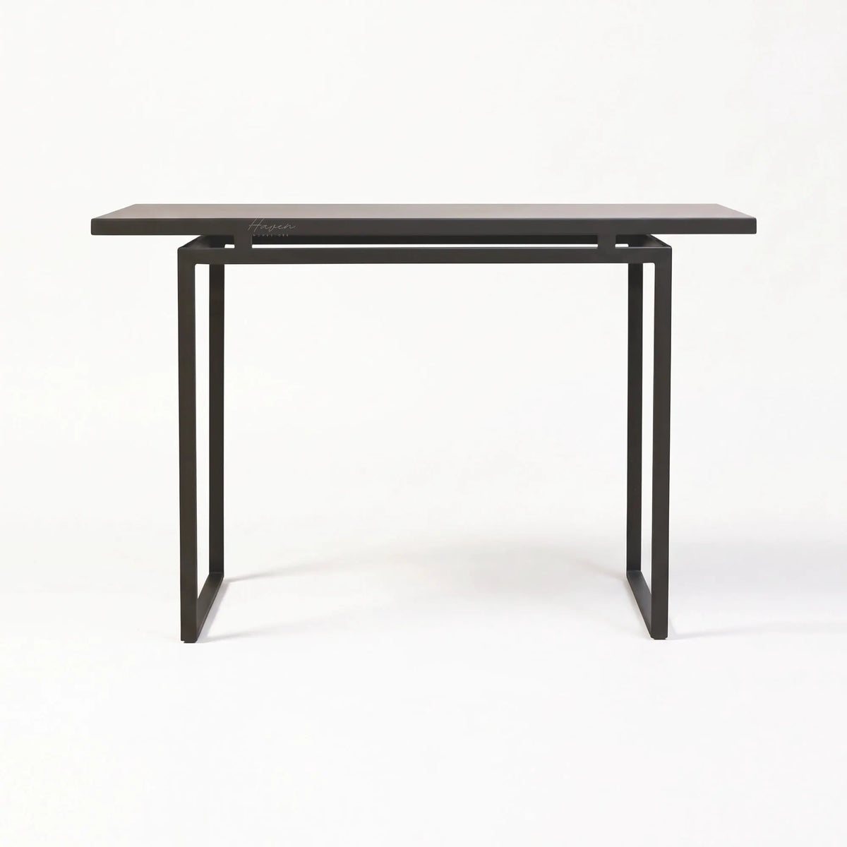 Modern greyed-brown console table with slim metal profile and open base frame for understated architectural entryway decor.