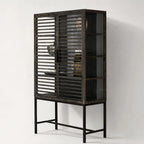 Kuro Slatted Cabinet in dark oak with glass behind slatted doors, warm, structured storage.
