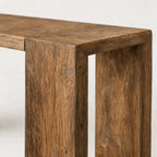 Casa Console in reclaimed elm with aged black wash; close-up of textured dark timber top and leg.