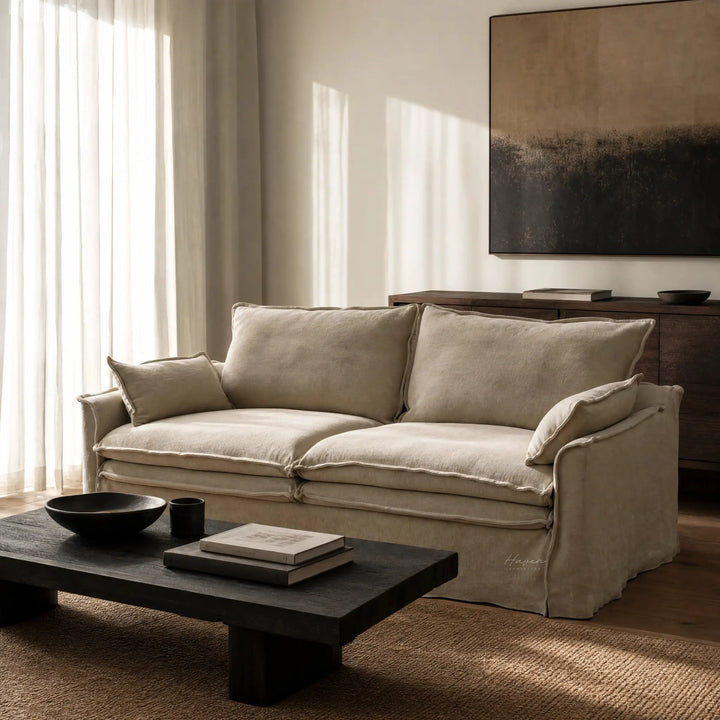 Sorrento 3 Seat Linen Sofa in beige linen with 100% feather fill, relaxed sink-in comfort in a cozy living room.