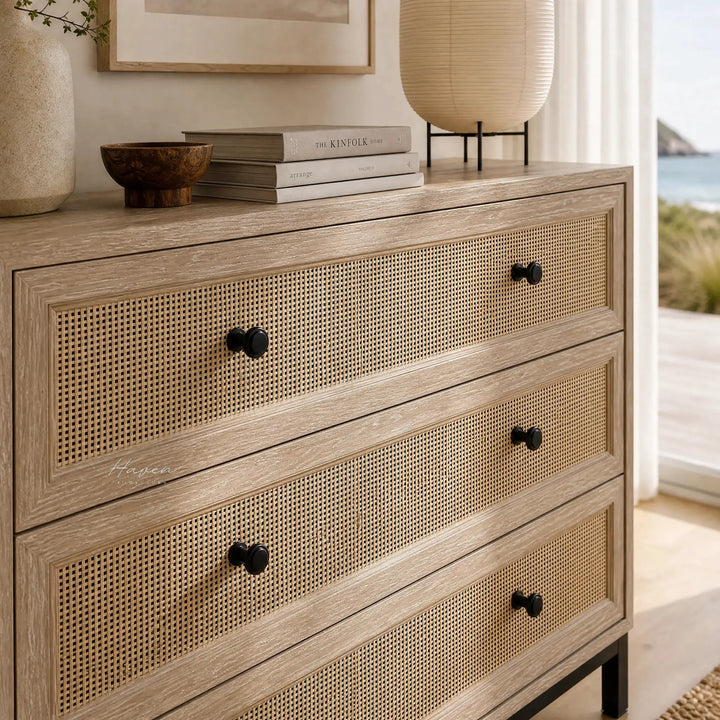 Cardrona 3 Drawer Commode with woven rattan fronts, timber frame, and slim black iron base.