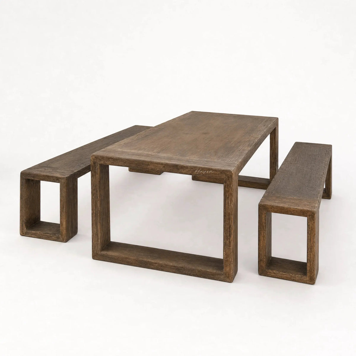 Reclaimed elm dining table with matching open-frame benches showcasing rich grain and weathered character.