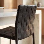 Calibri Counter Stool backrest with woven PU leather strips and a slim powder-coated metal frame.