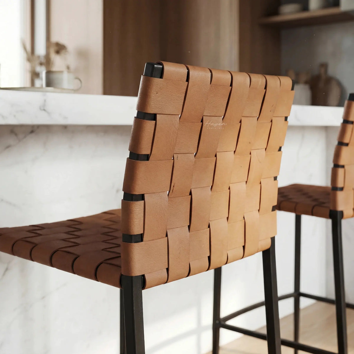 Calibri Counter Stool with woven PU leather seat and slim powder-coated metal frame in a kitchen.