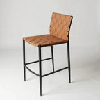 Calibri Counter Stool with tan woven PU leather seat and slim black powder-coated metal frame.