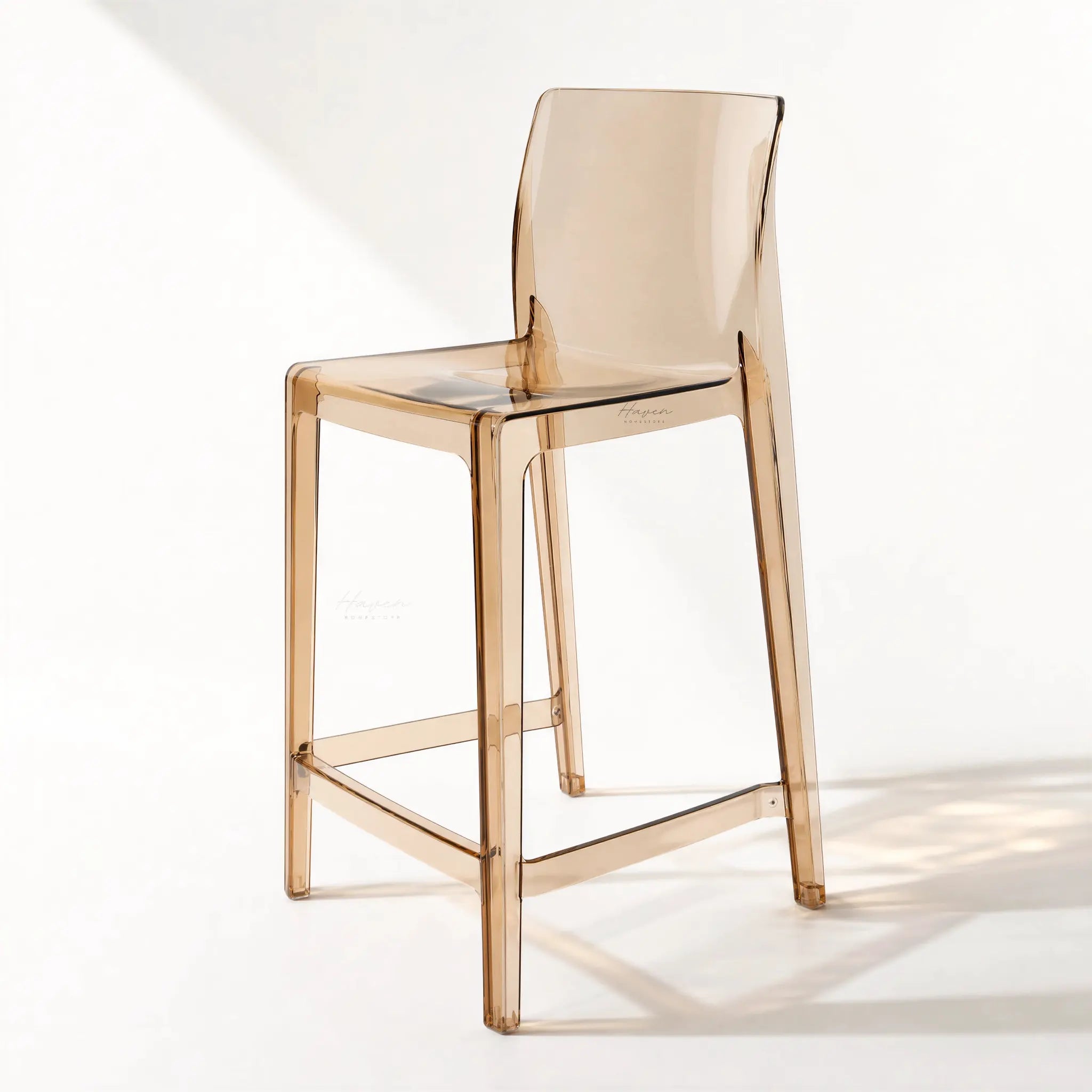 Jupiter Counter Stool in translucent polycarbonate, modern, light, space-saving design.