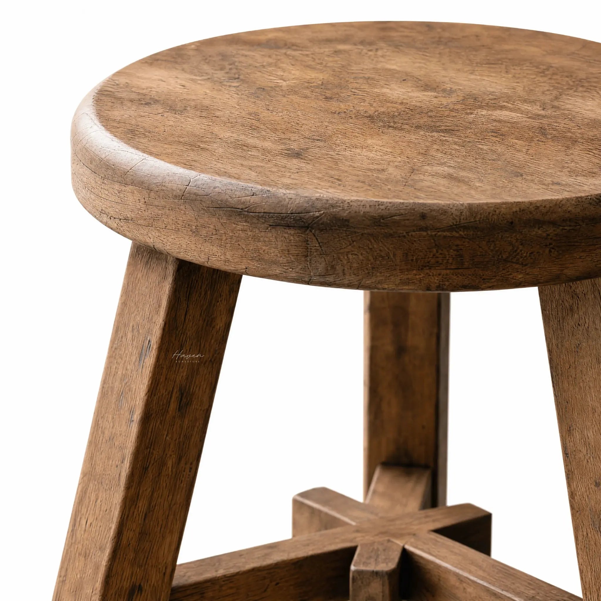Rustico Stool: reclaimed elm with grain variations and weathered patina, sturdy rounded legs.