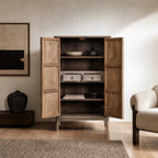 Lotus 2 Door Cabinet in weathered poplar with an aged finish; open doors reveal interior shelves.