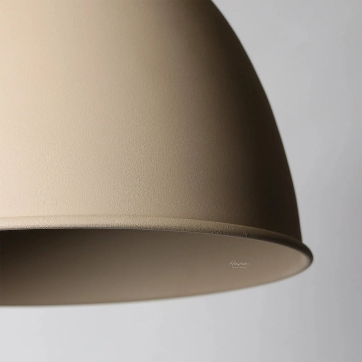 Scandi Pendant Light with iron body and mango wood detail, soft curved silhouette