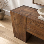 Plinth Console crafted from reclaimed antique elm with rich grain and bold architectural silhouette.