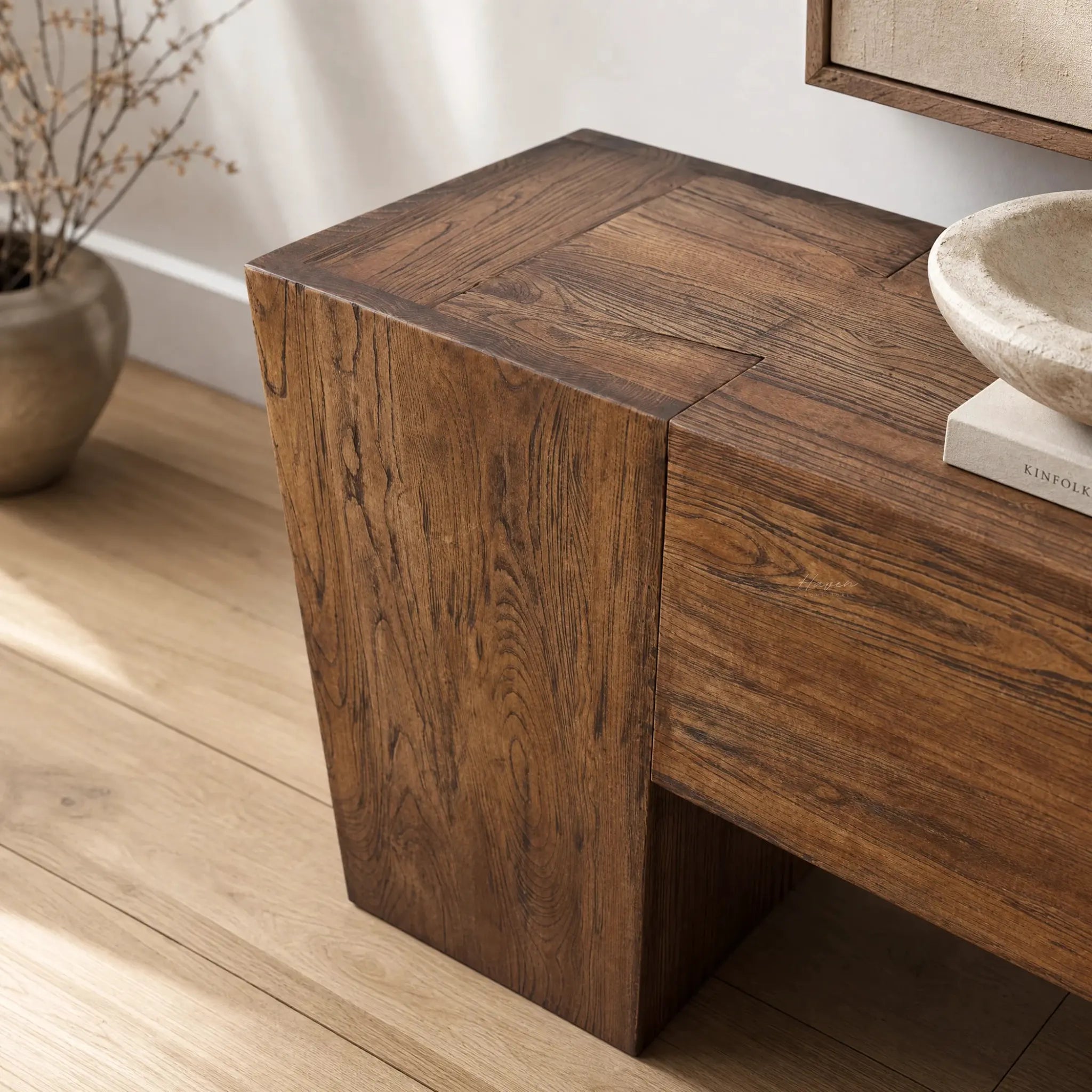 Plinth Console crafted from reclaimed antique elm with rich grain and bold architectural silhouette.
