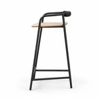 Black powder-coated iron counter stool with natural ash seat and padded leather backrest, minimalist Scandinavian design.