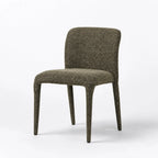 Textured polyester Noren dining chair in Lichen with a rounded back, cushioned seat, and slender profile.