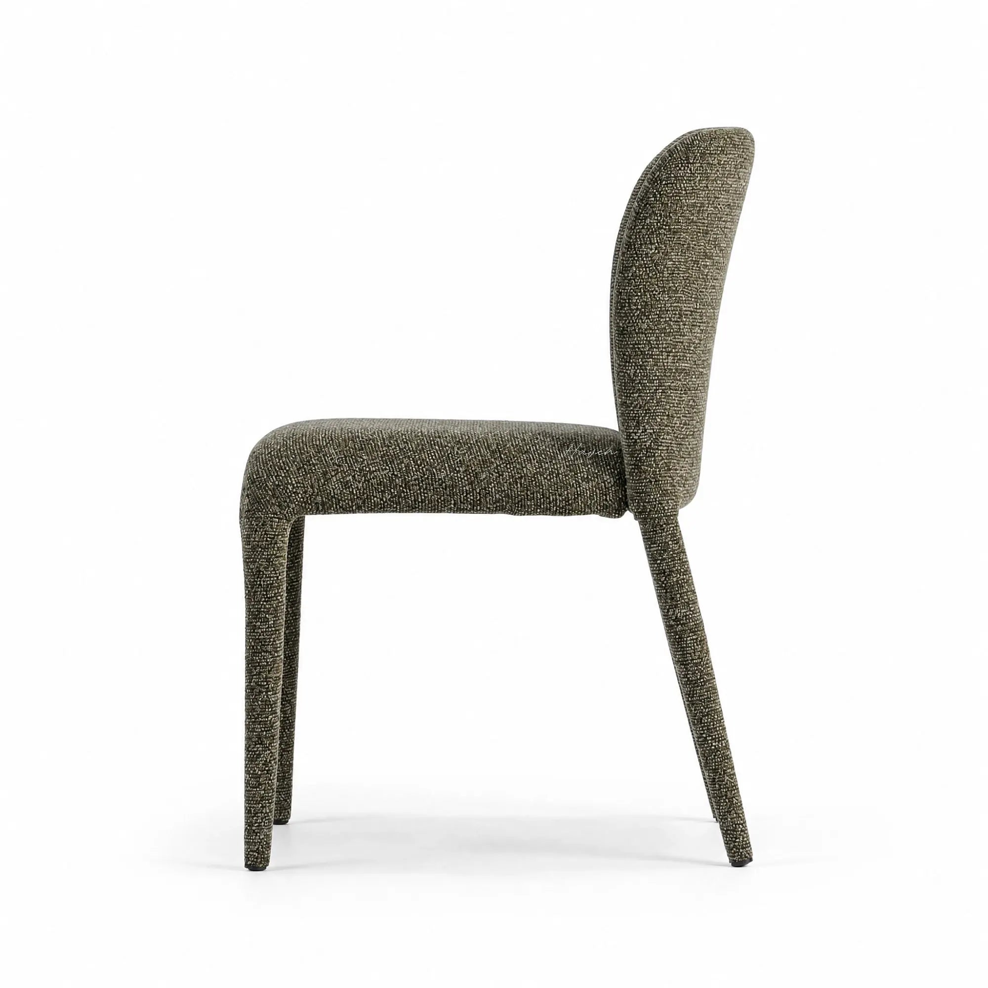 Side profile of a lichen green dining chair with textured upholstery, rounded back, and slender profile.