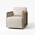 Aro swivel armchair with solid ash wood frame, woven rattan sides, and beige linen upholstery including a matching lumbar pillow.