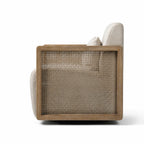 Solid ash wood swivel armchair featuring woven rattan side panels and soft beige linen-look upholstery for relaxed coastal comfort.