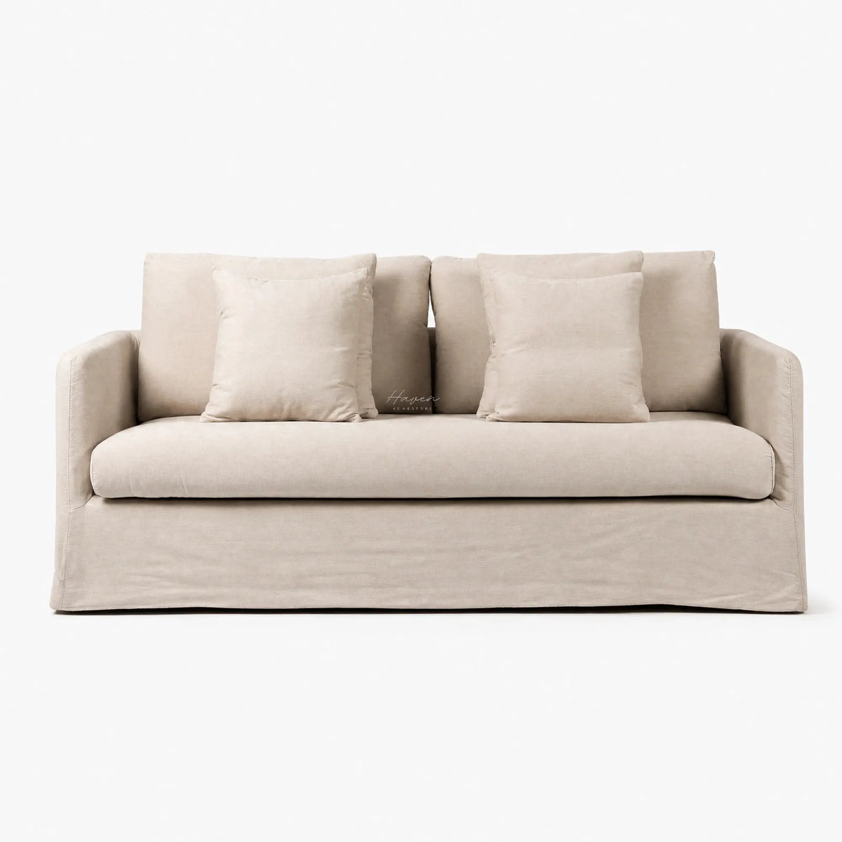 Beige Lumi slipcover sofa with soft tailored polyester fabric, generous cushioning, and matching throw pillows.