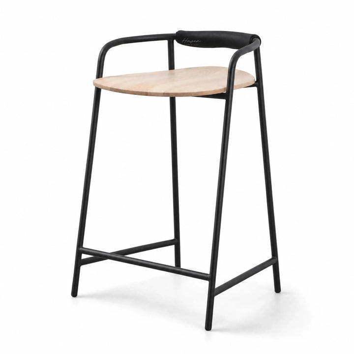Scandinavian counter stool with natural ash wood seat, black iron frame, and padded leather backrest.