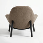 Pierre Chair - Latte with textured polyester upholstery and relaxed lounge appeal, black legs.