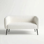 Ellie two-seat sofa with soft white polyester upholstery and slim powder-coated legs.