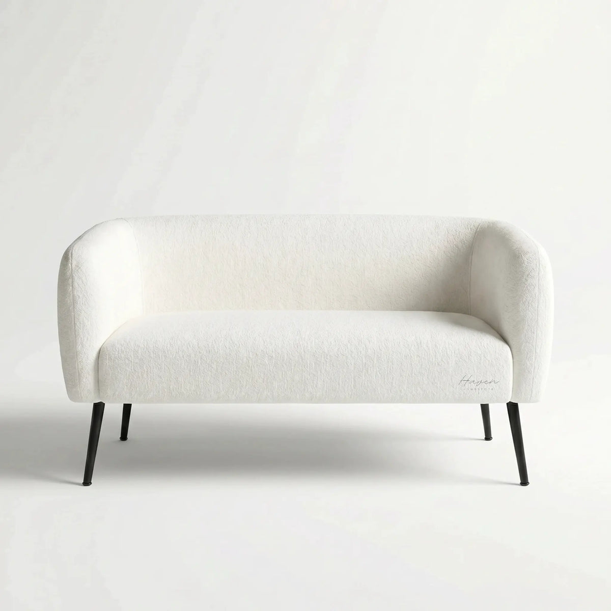 Ellie two-seat sofa with soft white polyester upholstery and slim powder-coated legs.