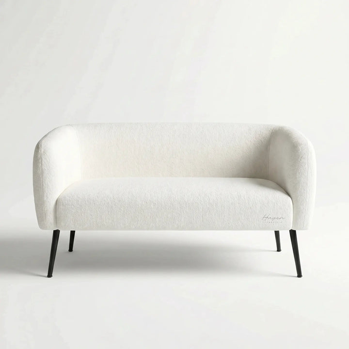 Ellie two-seat sofa with soft white polyester upholstery and slim powder-coated legs.