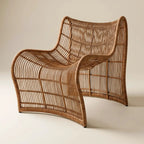 Wave Chair: sculptural woven outdoor chair with a lightweight aluminum frame in warm brown.
