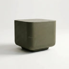 Vista Bowie Square Side Table in pinhole textured GRC with a natural stone-like finish.