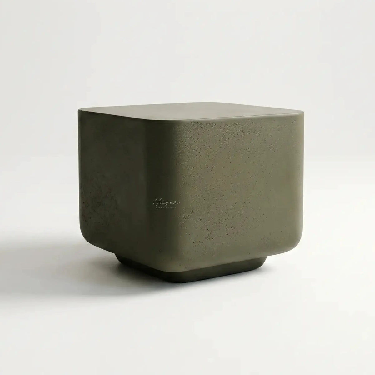 Vista Bowie Square Side Table in pinhole textured GRC with a natural stone-like finish.