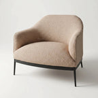 The Sydney Chair in taupe, textured recycled-polyester fabric with a relaxed silhouette and black metal legs.