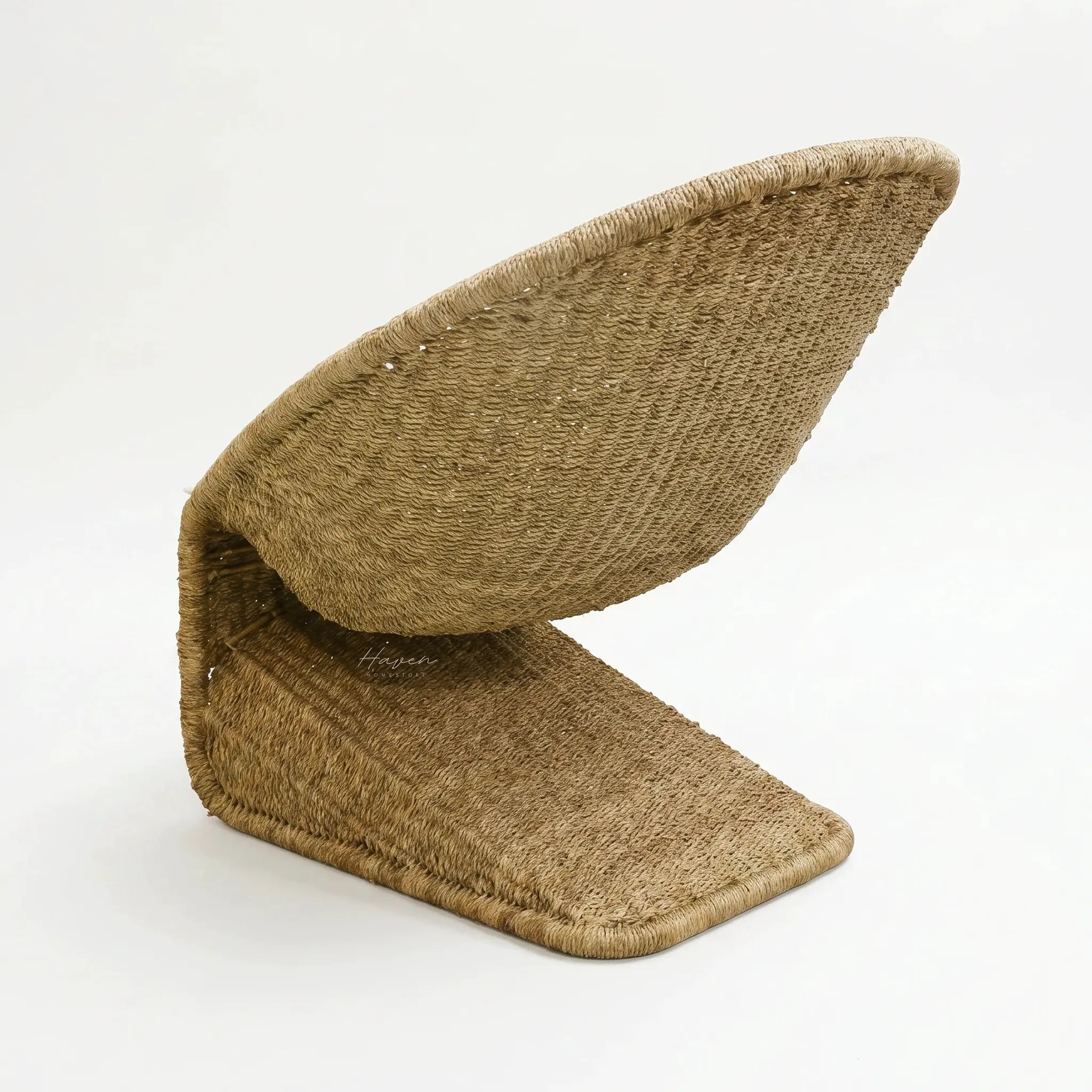 Scoop Chair with handwoven water hyacinth rope, curved natural frame in brown.