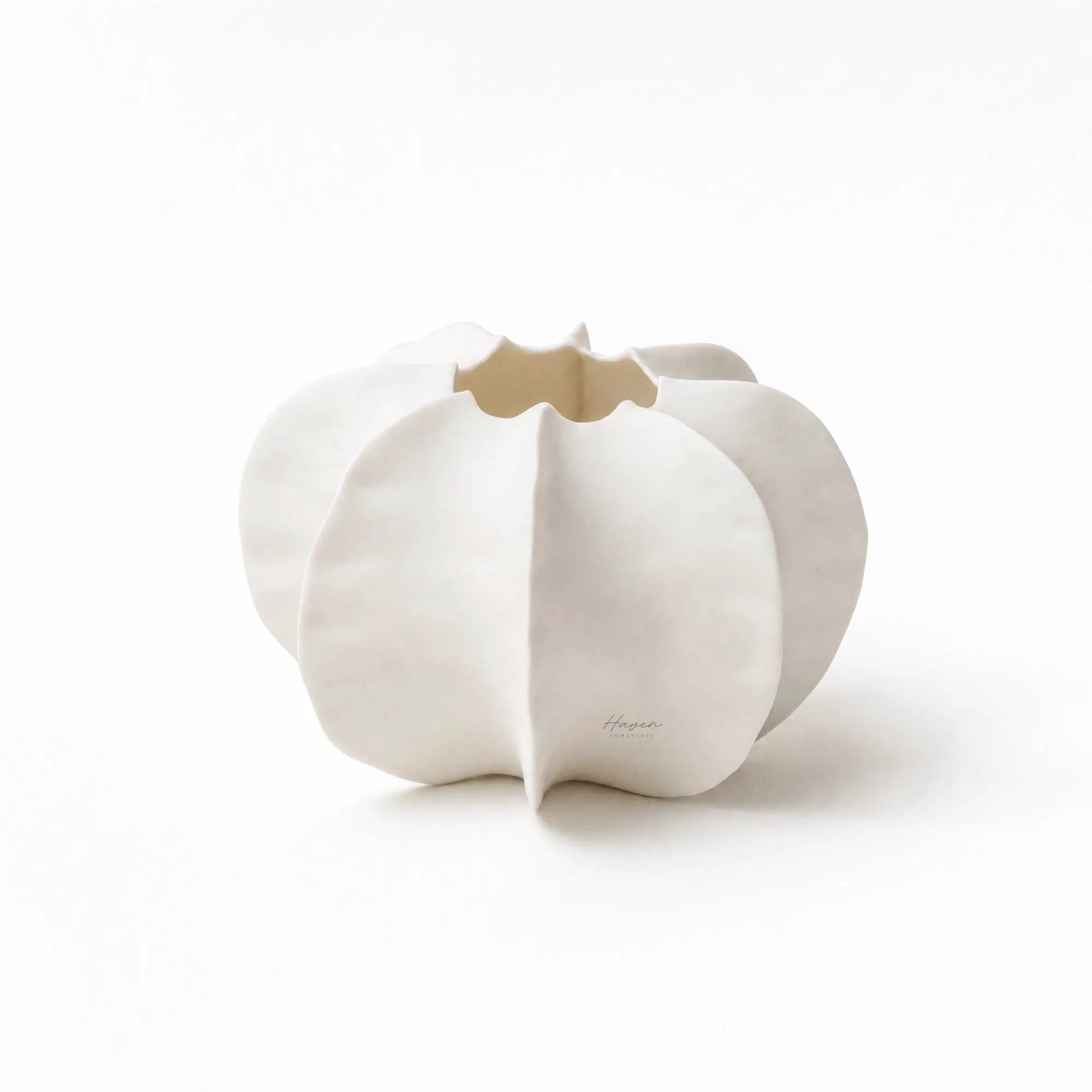 Suzu vase made of fine bone china by artisan family in the Philippines. Sculptural statement piece for home decor