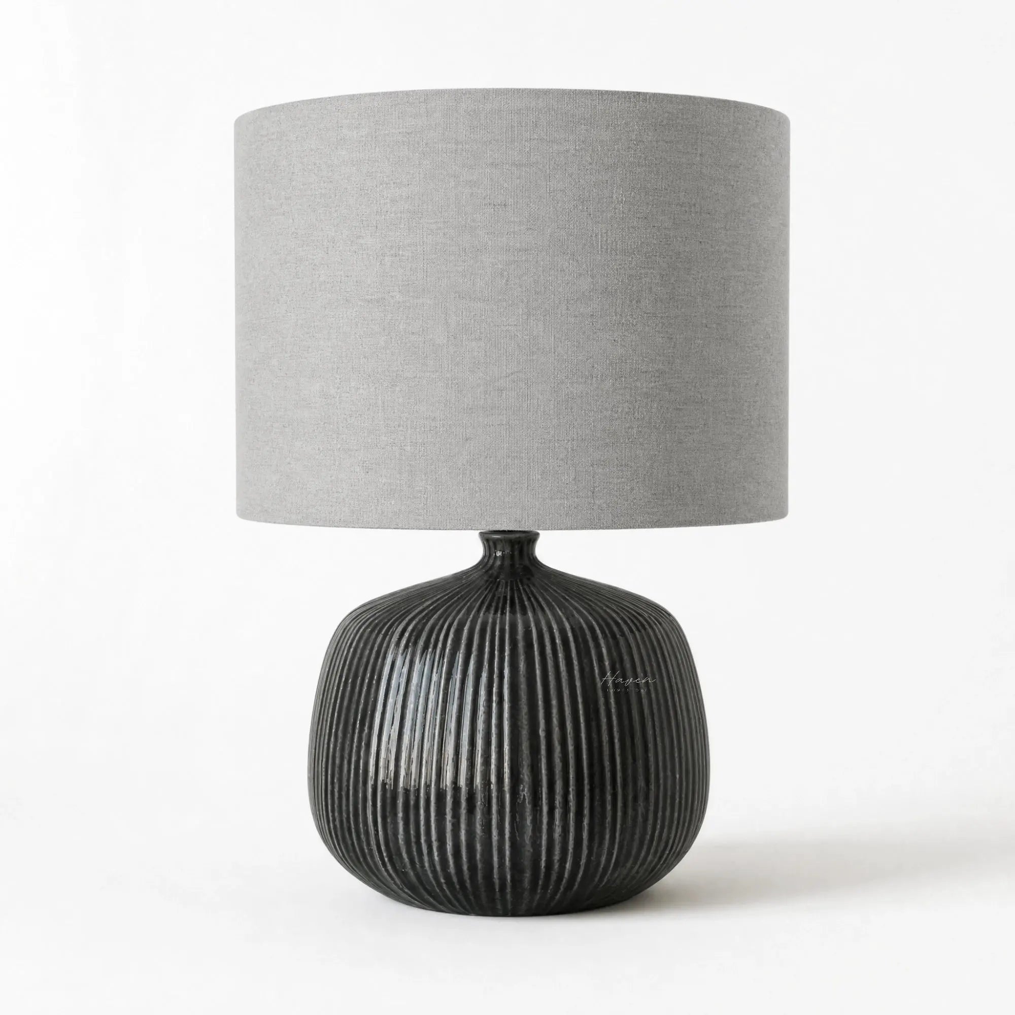 Aksel Table Lamp in Slate with a ribbed ceramic base and linen shade, grey-toned